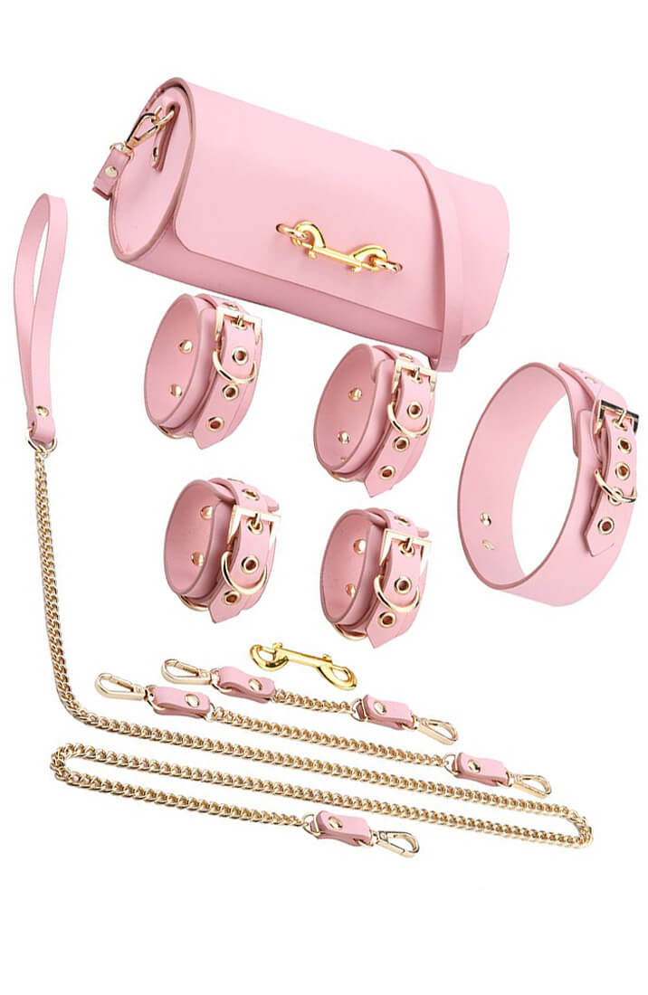 Pink vegan leather bondage set with matching rounded bag