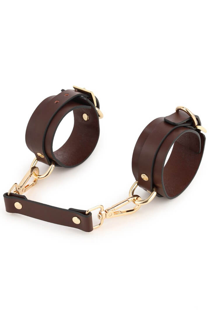 Brown bondage kit with adjustable vegan leather gear