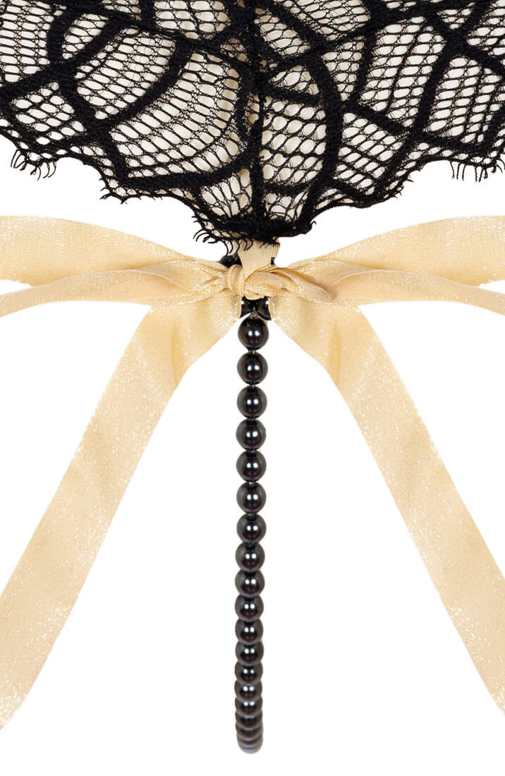 Black lace brief with stimulating pearl string and eco materials by COAX Copenhagen