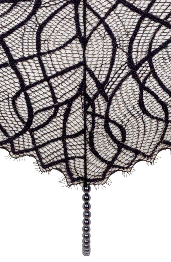Retro-style black panty with stimulating pearl string and satin tie from COAX Copenhagen
