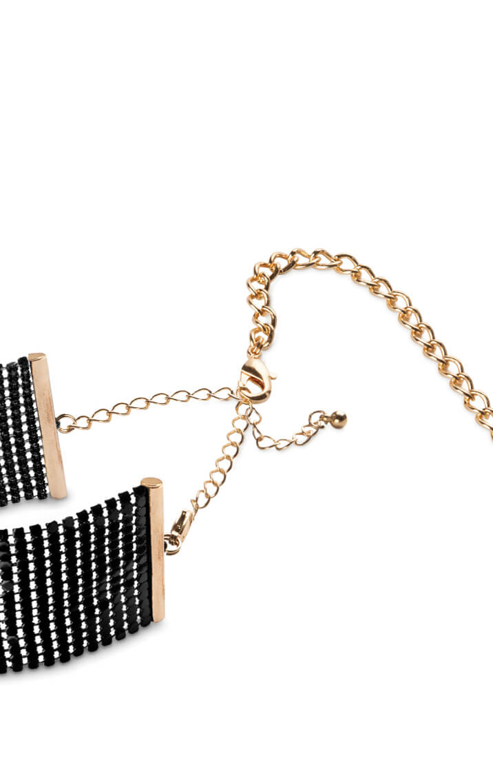 Black metallic cuffs with gold chain
