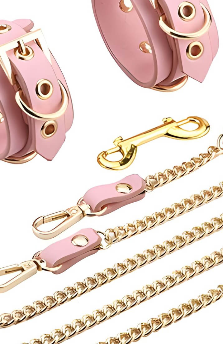 Close-up of vegan leather pink restraints and metal hardware