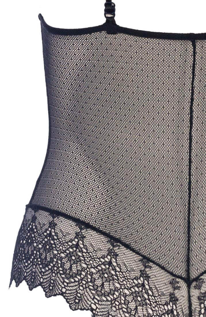 Black bodysuit in sheer lace with white Manacor pearls and open design by COAX Copenhagen