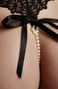 Crotchless thong with white pearl string