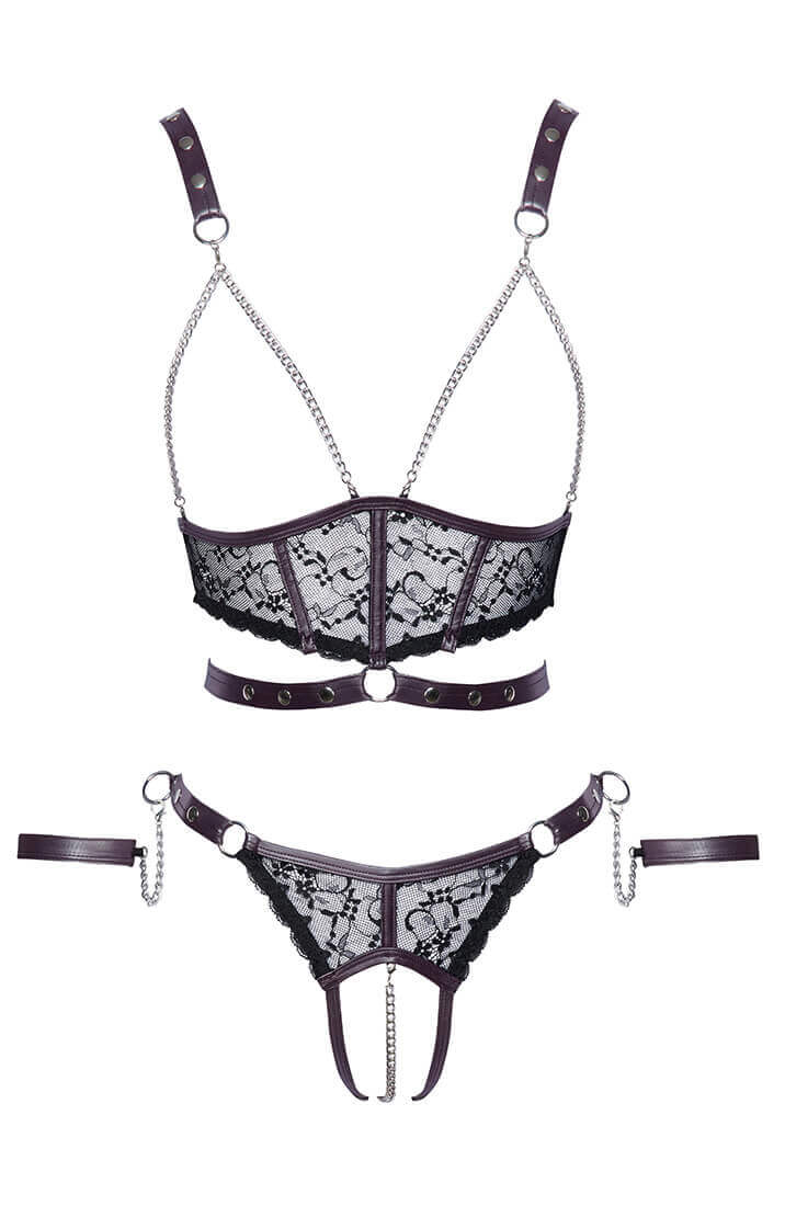 Close-up of chain framing the bust on open-cup bustier lingerie with wet look accents
