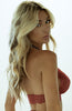 Alexa Collins wearing COAX Copenhagen red lace bustier bralette with black pearl choker and gold lurex details