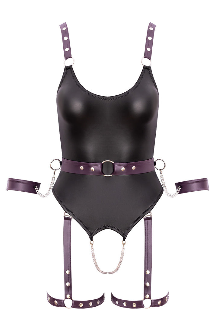 Provocative crotchless lingerie with belt, thigh straps, and silver hardware