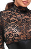 Sheer black lace catsuit with wet look bodice