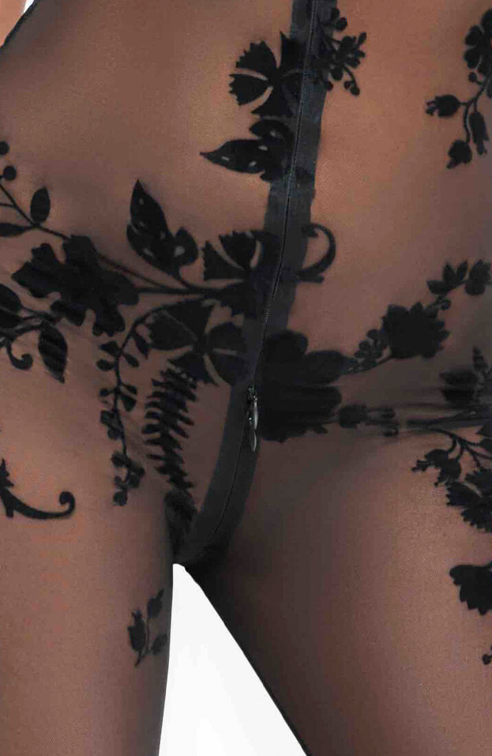 Figure-hugging sheer mesh catsuit with a high-neck halter design for a daring, confident look